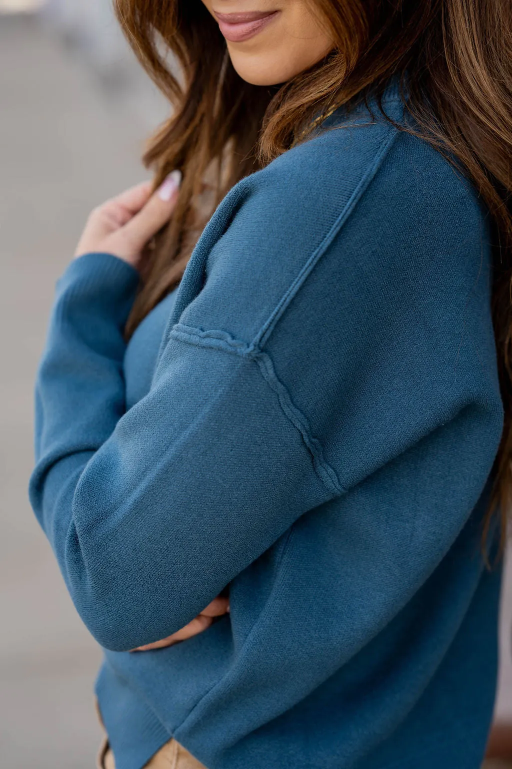 Raw Stitched Side Slit Sweater